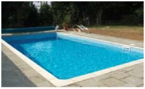 The volume of water in a rectangular, in-ground, swimming pool is given